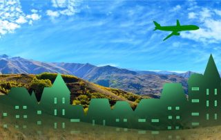 Beautiful country side with grassy mountain vistas and artistically-styled green cityscape & airplane