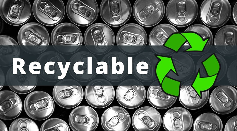 Taber Extrusions Social Study: Aluminum’s Economic Impact An image of the tops of a bunch of shiny, unopened aluminum cans beneath a gray banner with the word “Recyclable” and a graphic of the green recycling symbol next to it.