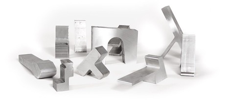 Nine varieties of aluminum alloys in different extrusion profile shapes and sizes.
