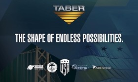 Blue shaded gradient over a photograph of a bridge tower and its suspension cables on the left and the U.S. flag on the right. Taber’s logo is at the very top and beneath it are the words, “The Shape of Endless Possibilities.” The logos designating minority-owned business enterprise (ISO 9001, AS 9100, NADCAP, and ABS-certified) are across the bottom in white print.