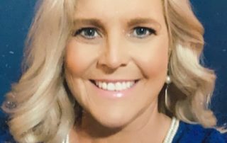 A professional headshot of Taber's In Focus Spotlight and National Account Manager (Southeast), Lisa Fortner.
