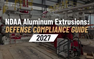 The words “NDAA Aluminum Extrusions: DEFENSE COMPLIANCE GUIDE 2027” overlaying a darkened photo of Taber’s 10,000-ton aluminum extrusion press at their Russellville facility.