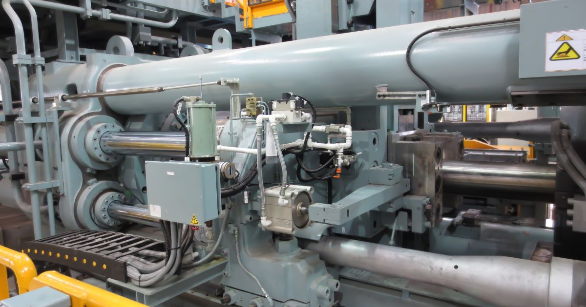 Taber-2026-06-largest-aluminum-extrusion-press-north-america Massive 10,000-ton aluminum extrusion press demonstrating large-scale manufacturing capabilities for aerospace and defense applications.